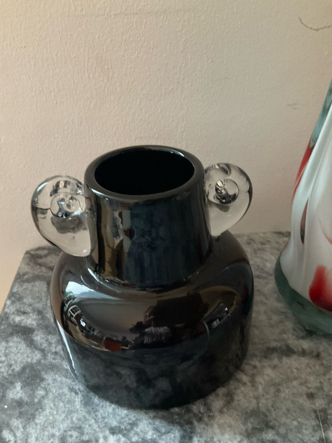 Two vintage ear vases made of Murano glass.