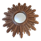 Miroir soleil vintage , en bois doré .