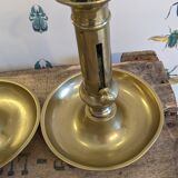 Bougeoirs à poussoirs en laiton doré