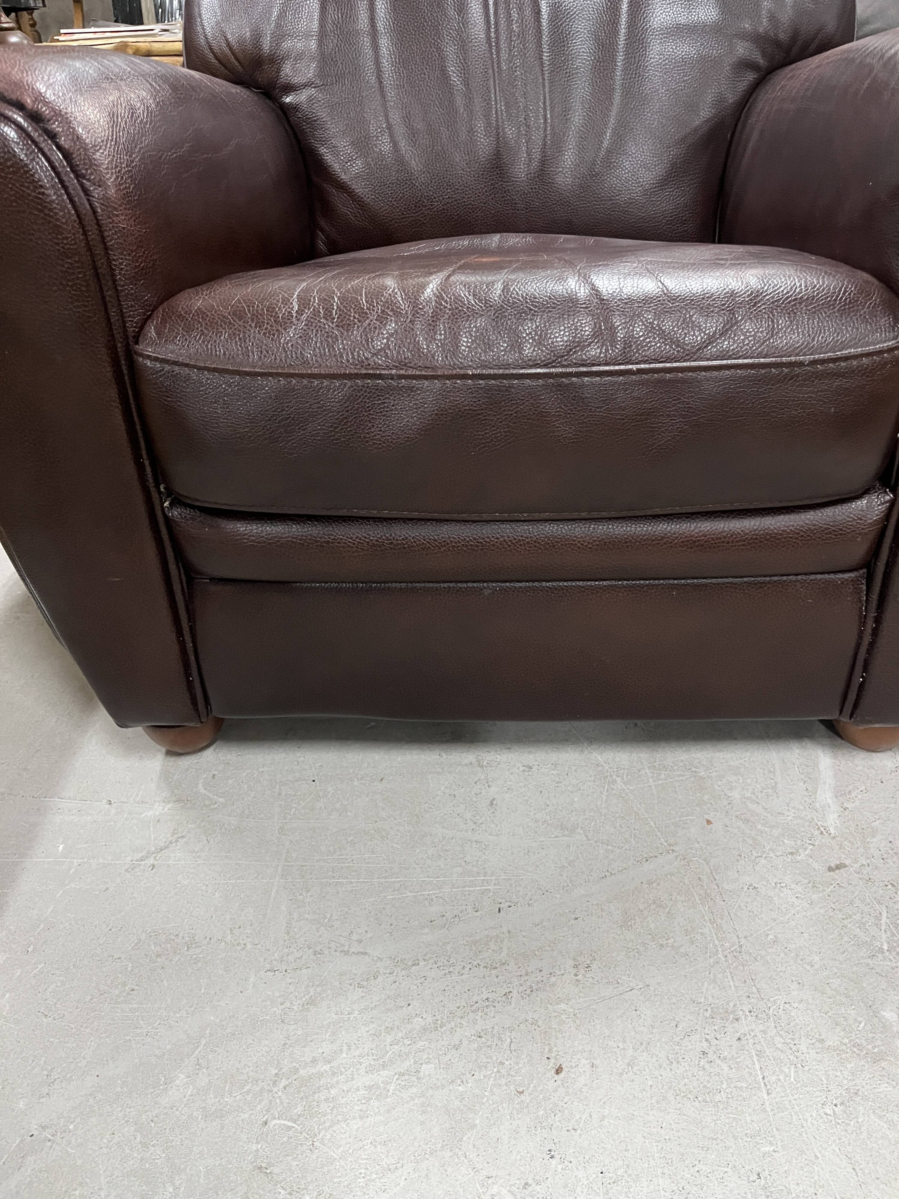 Brown leather club chair