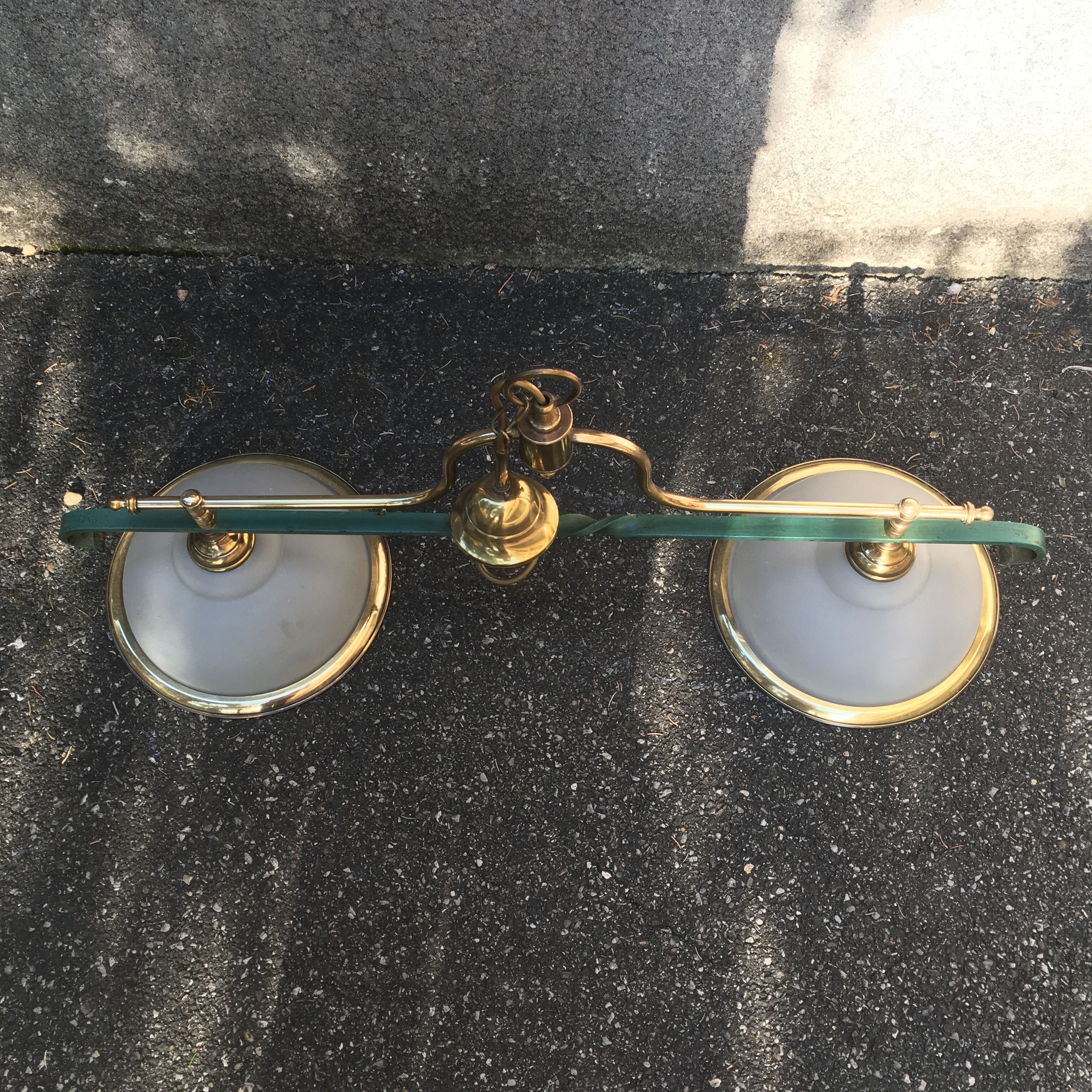 Great hanging double glass, iron and brass.