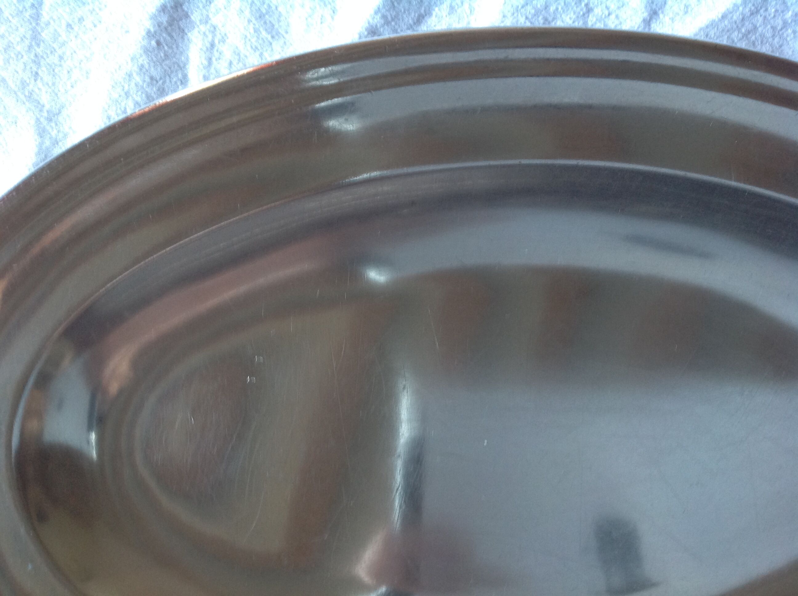 Old oval dish in silver metal