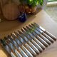 12 large Christofle Ribbons silver metal knives