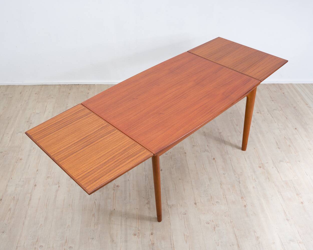 Teak dining table, made in Denmark, by the company Glos.