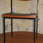 Pair of teak and iron stacking chairs, 1960s