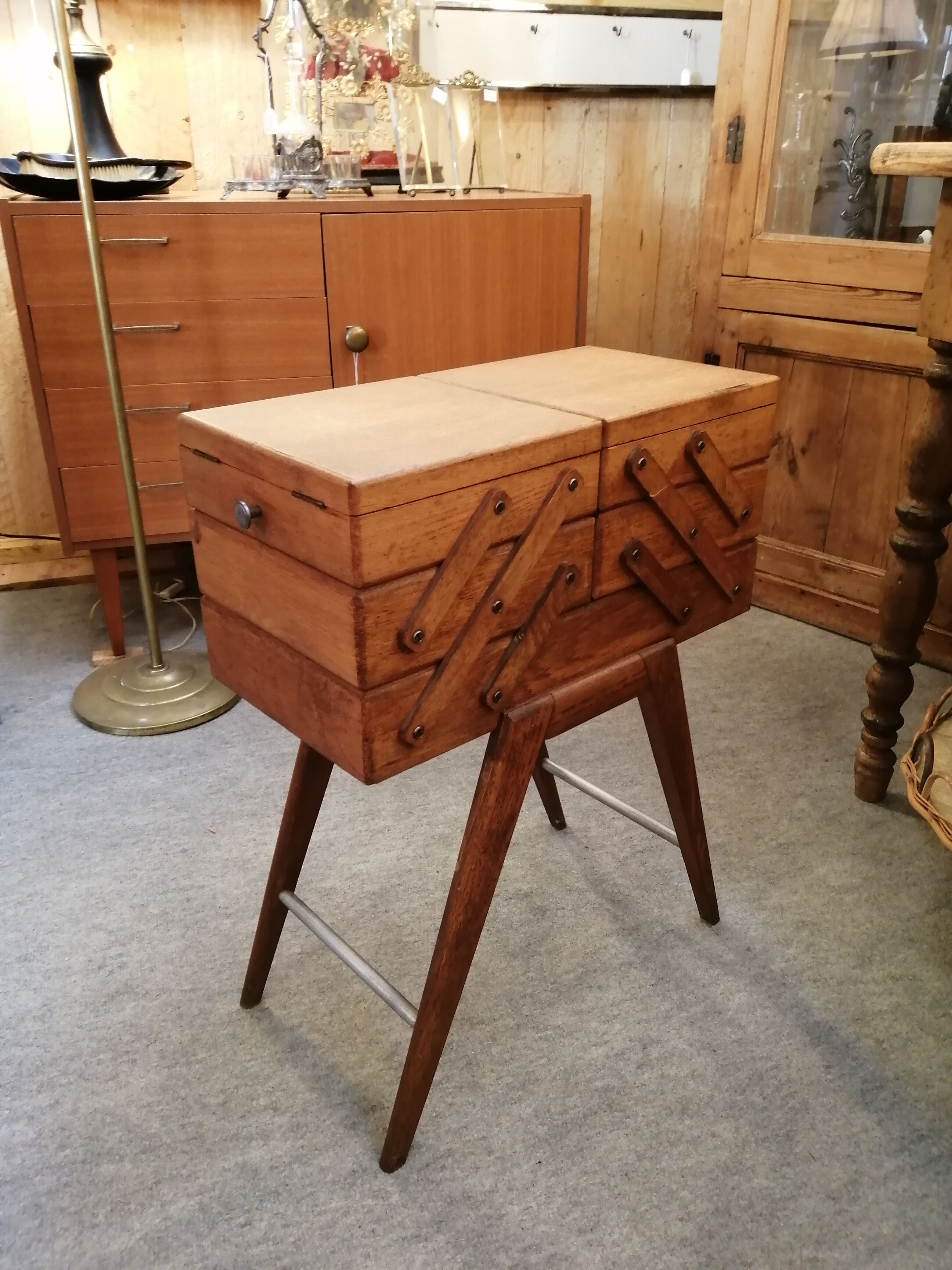 Worker sewing box feet compass