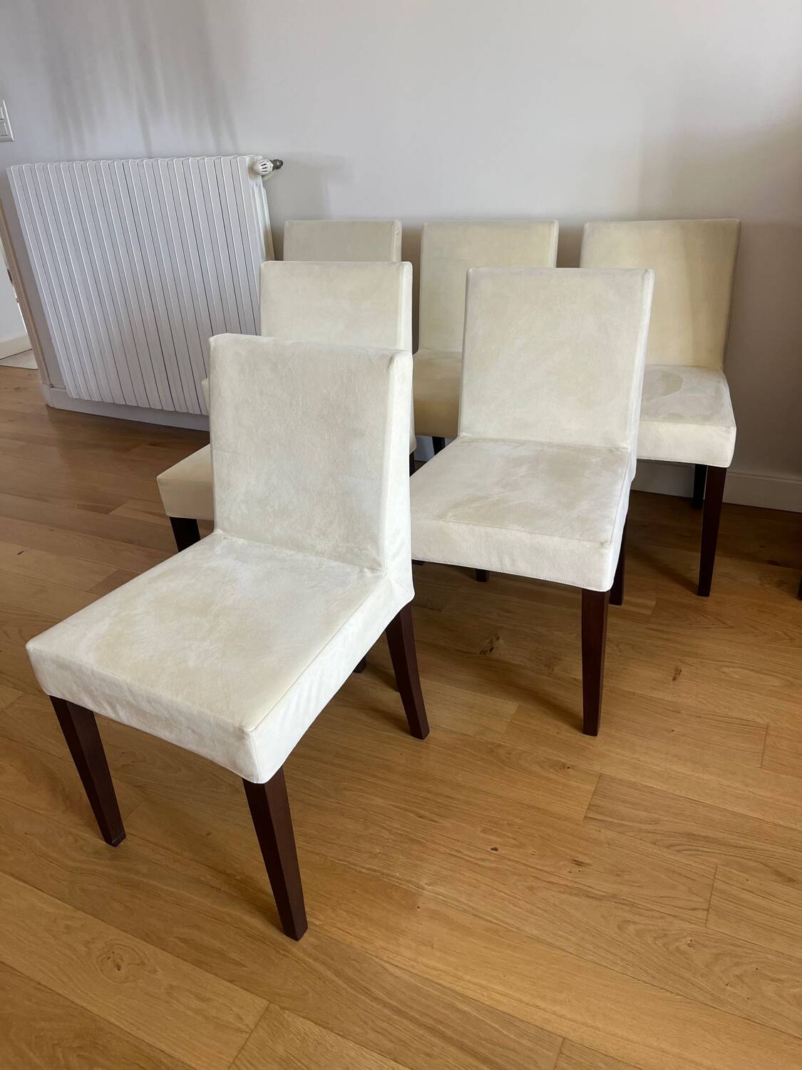 6 Ligne Roset chairs in ivory alcantara.