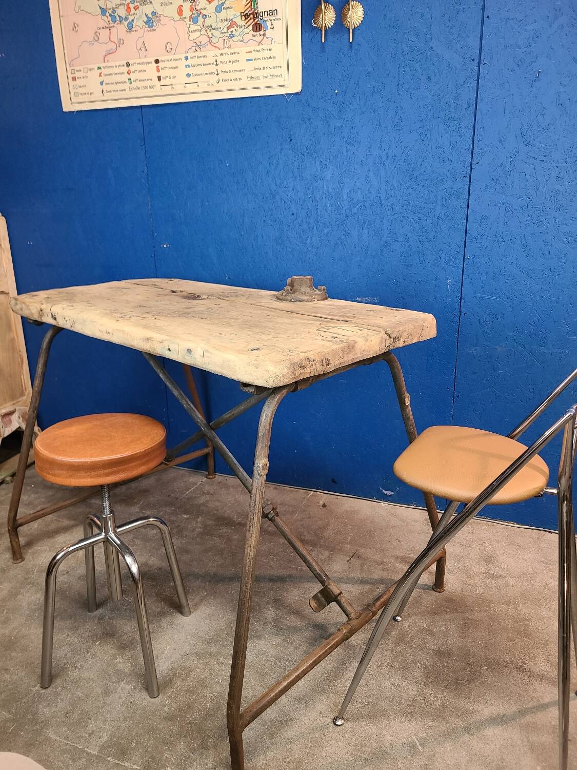 Vintage workbench circa 1930, folding metal leg.
