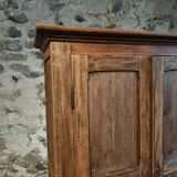 Antique French wardrobe in oak and pine, late 19th century.
