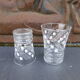 Service a liquor composed of 7 glasses a geometric patterns and d a tray