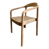 Solid wood chair with woven seat and armrests