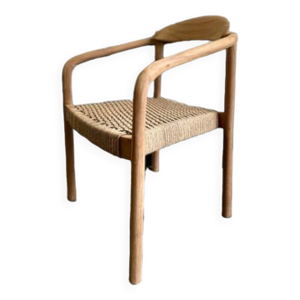 Solid wood chair with weaved seat and armrests