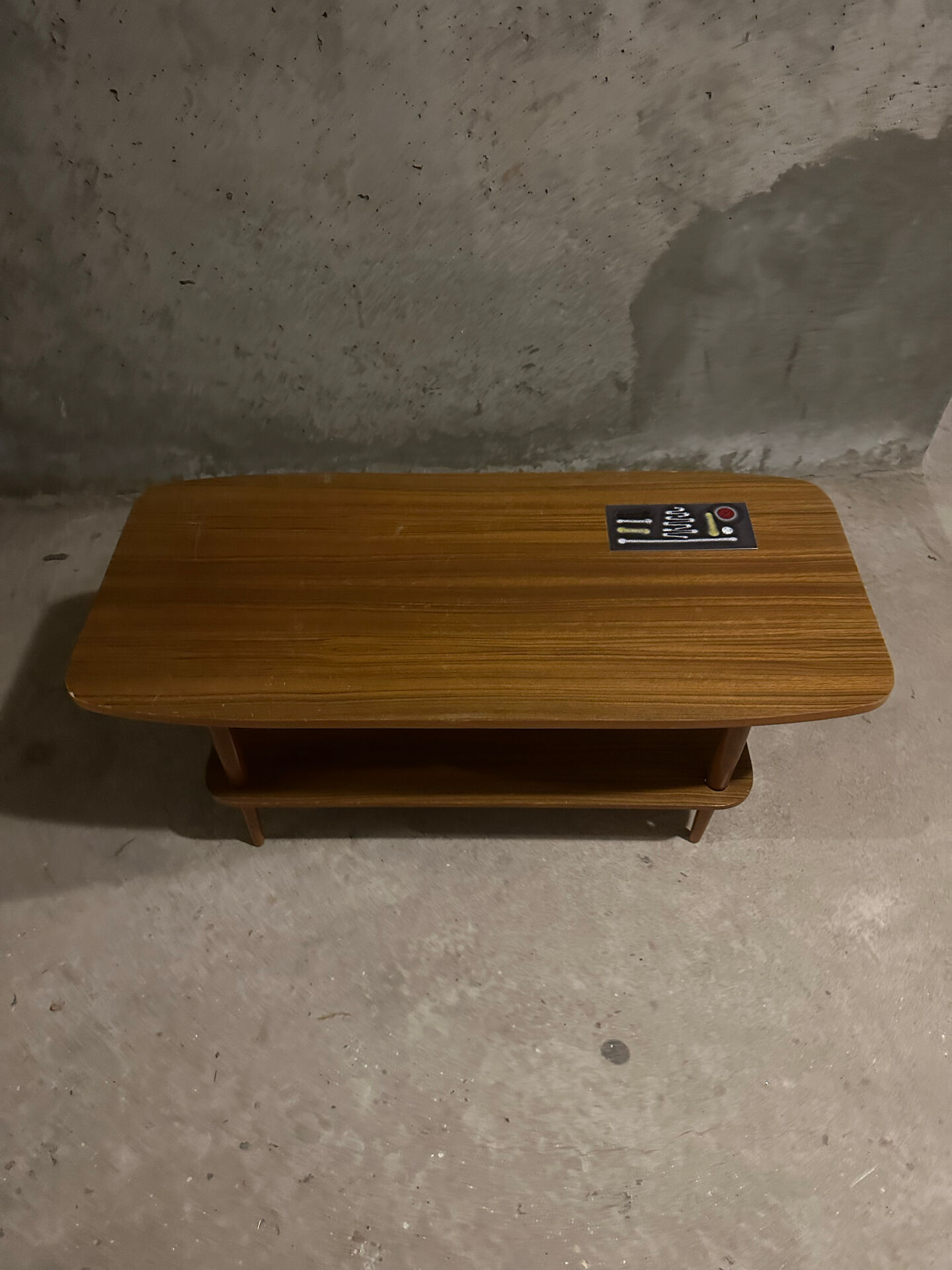 Scandinavian coffee table in teak and ceramic from the 1960s.