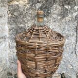 Vintage wicker demijohn