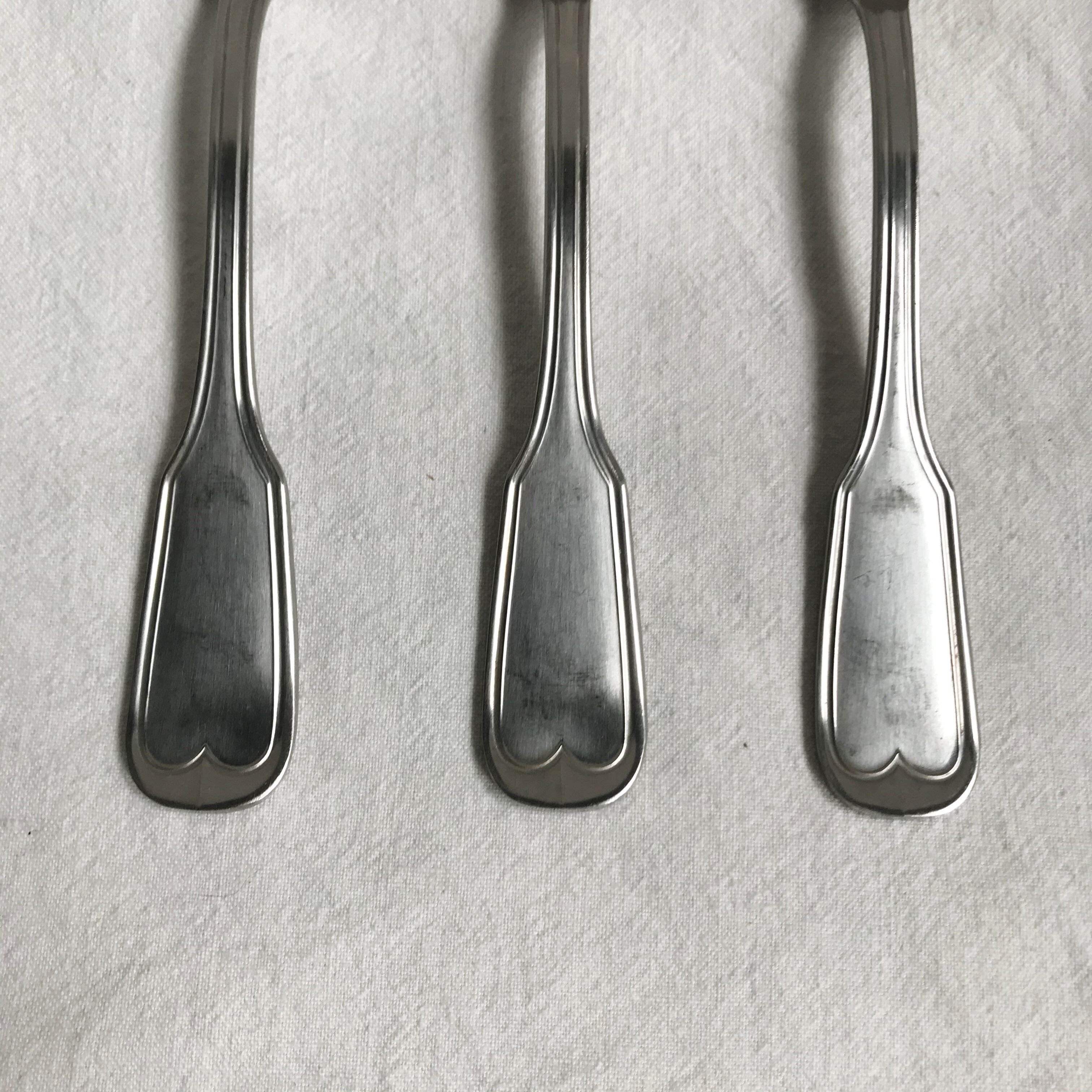 Eleven Guy Degrenne forks in silver metal