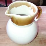 Set of three glazed stoneware pitchers