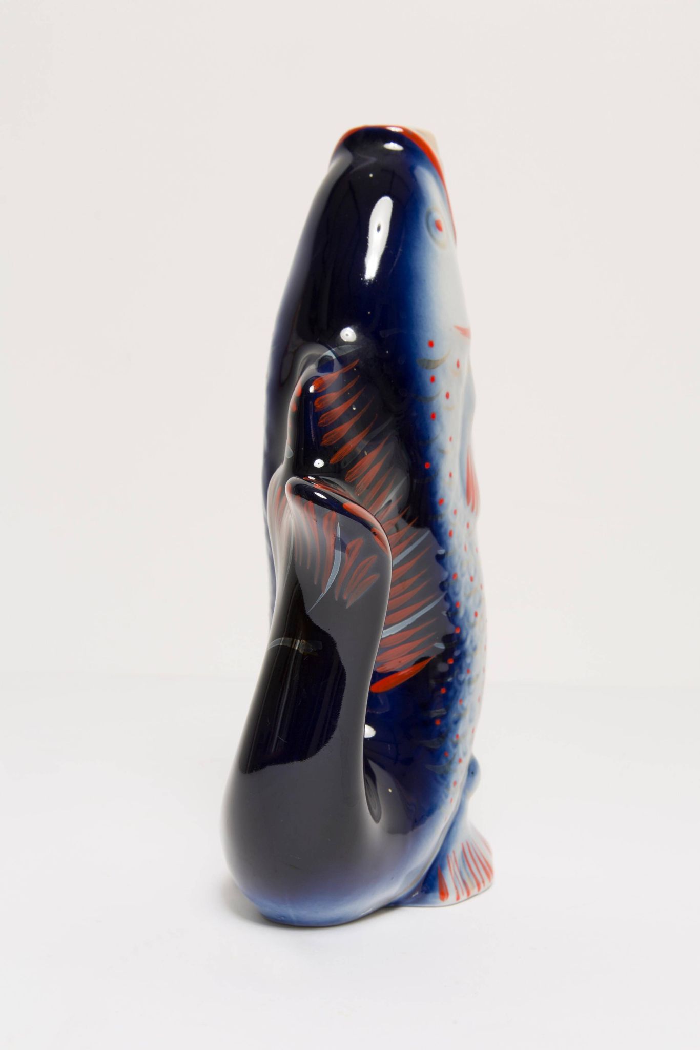 Set of 7 blue glass fish, mid-20th century.