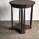 Art Nouveau side table in brown mahogany, circa 1920, with sculpted lines.