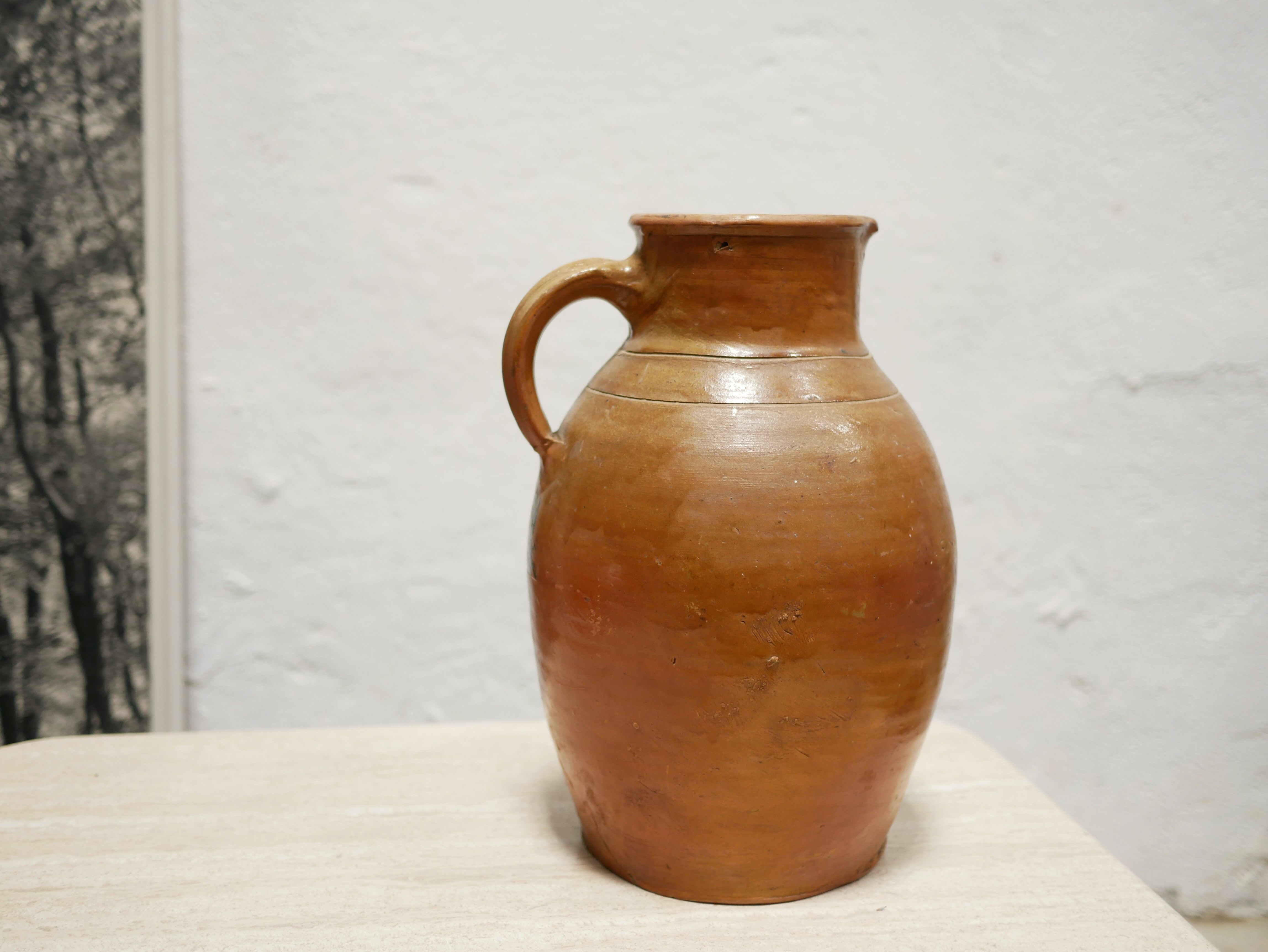 Pot à lait vintage en terre cuite vernissée