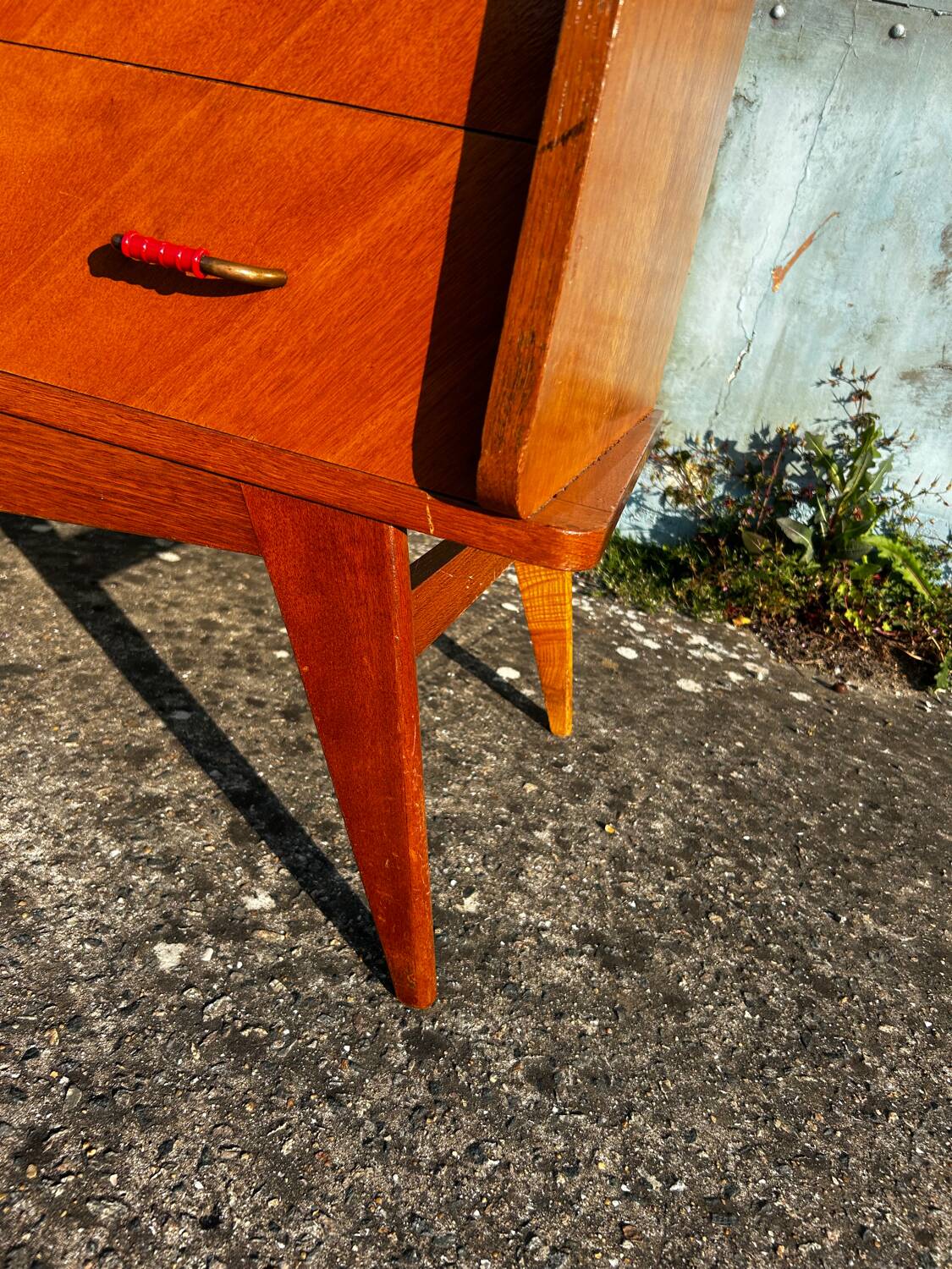 Vintage chest of drawers with compass feet.