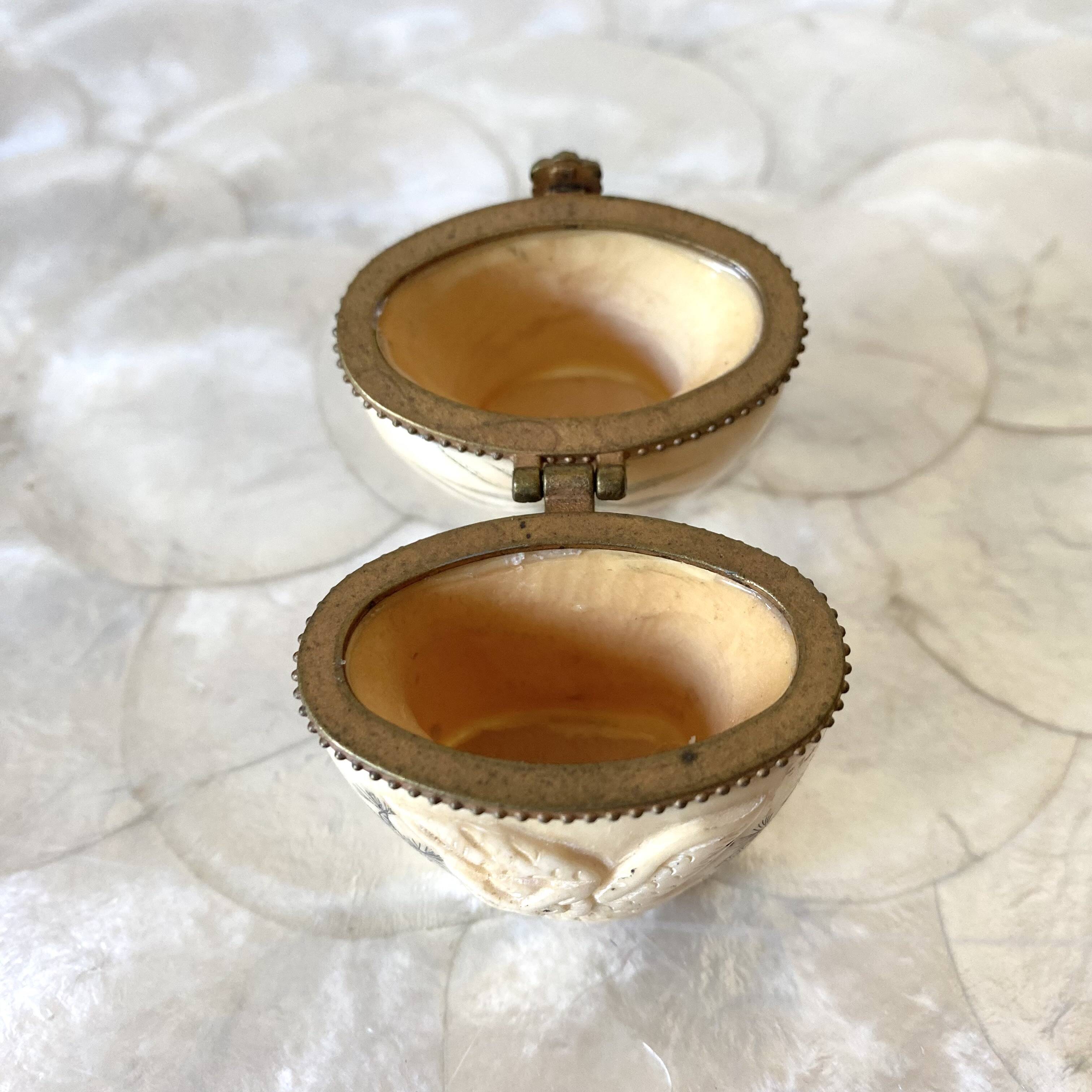 Ivory and brass owl and ermine box