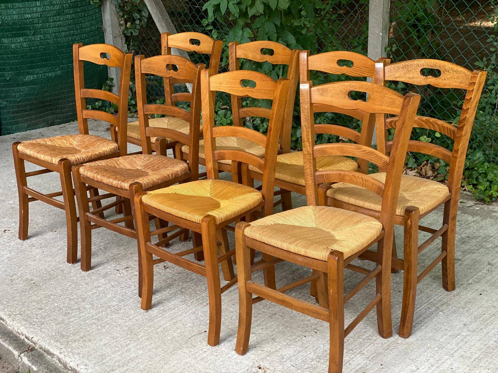 12 solid wood and straw chairs