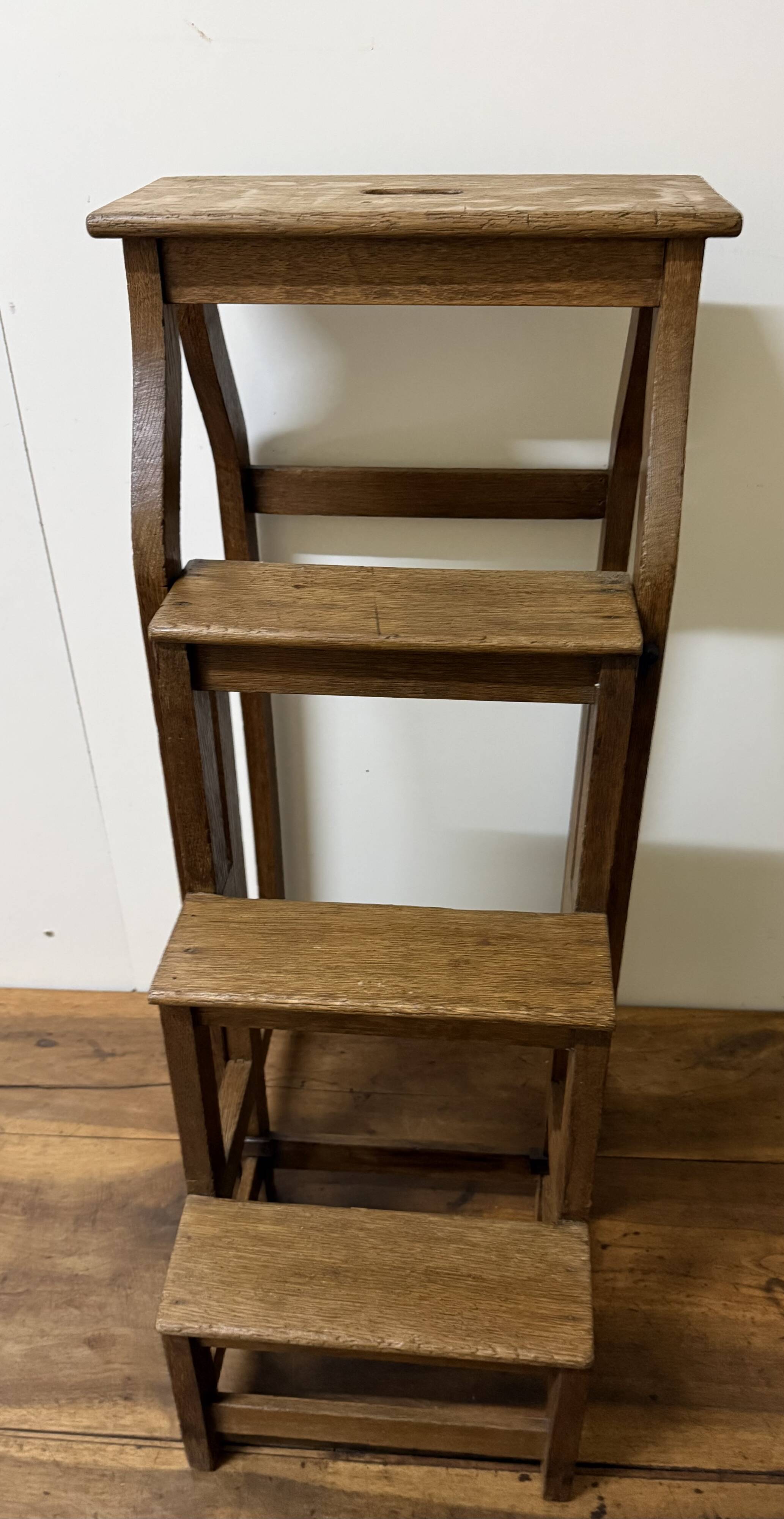 Stool transforming into a step ladder.