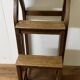 Stool transforming into a step ladder.