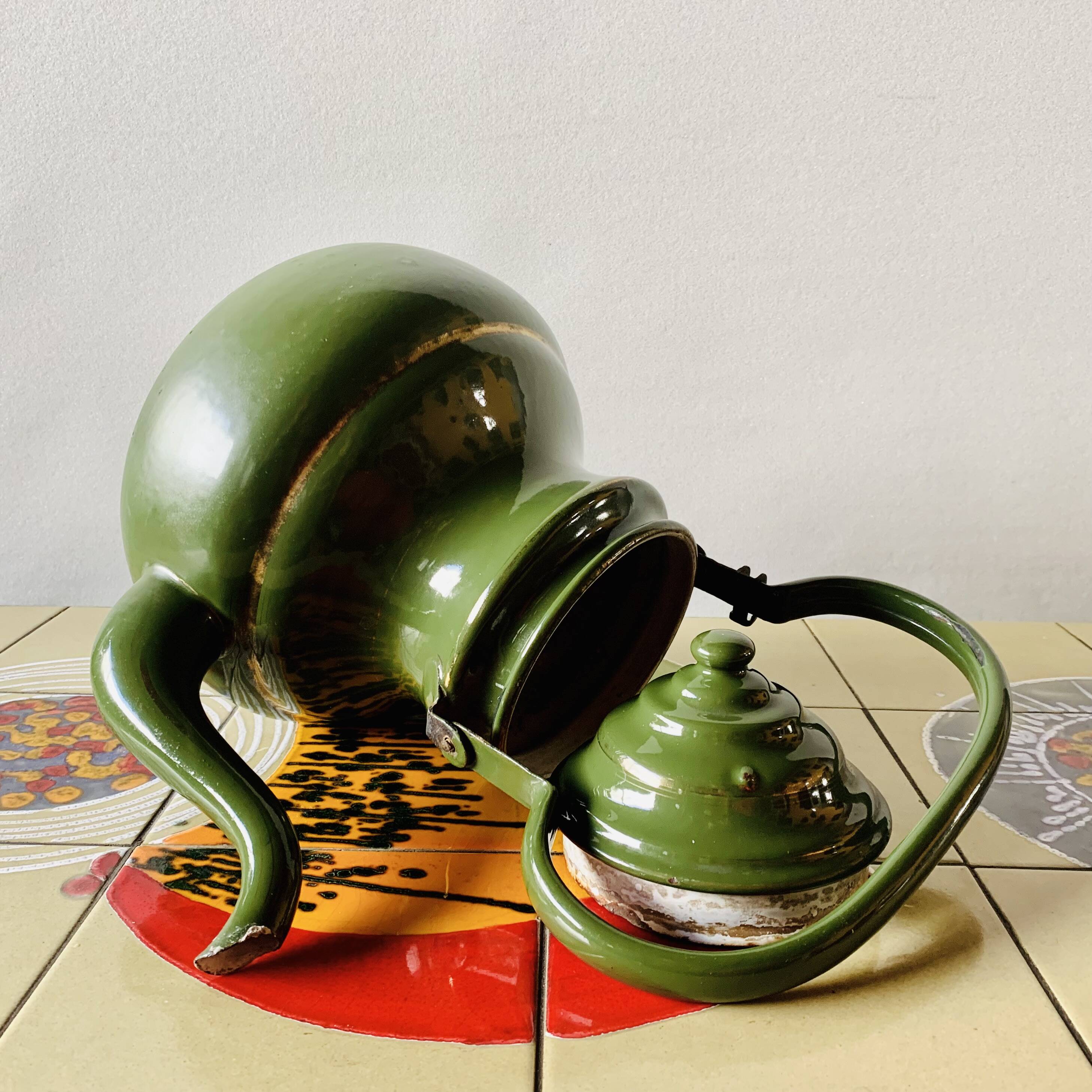 Vintage green enameled sheet metal kettle