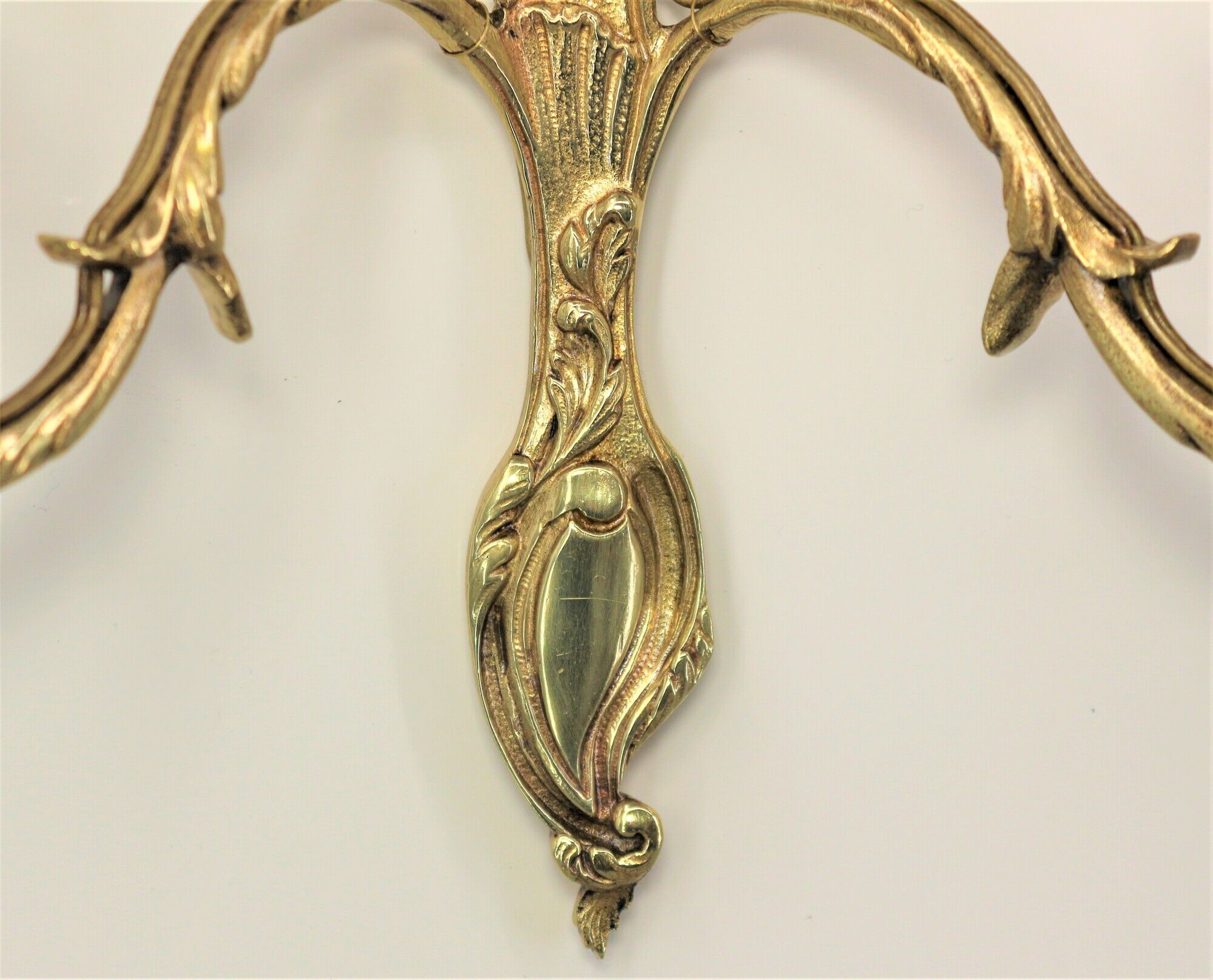 Pair of louis XV beveled mirror wall lamps in bronze by "Lucien Gau"