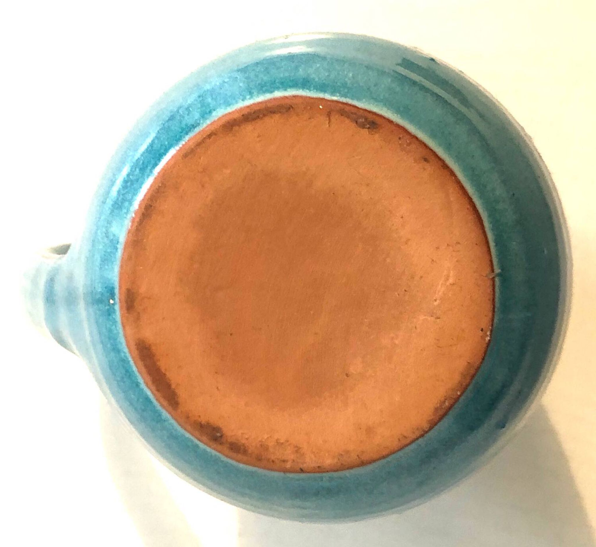 Blue ceramic pitcher