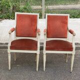 2 Louis XVI armchairs in solid wood and orange velvet.