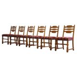Vintage 1960s Danish farmhouse oak dining chairs in the style of Henning Kjærnulf
