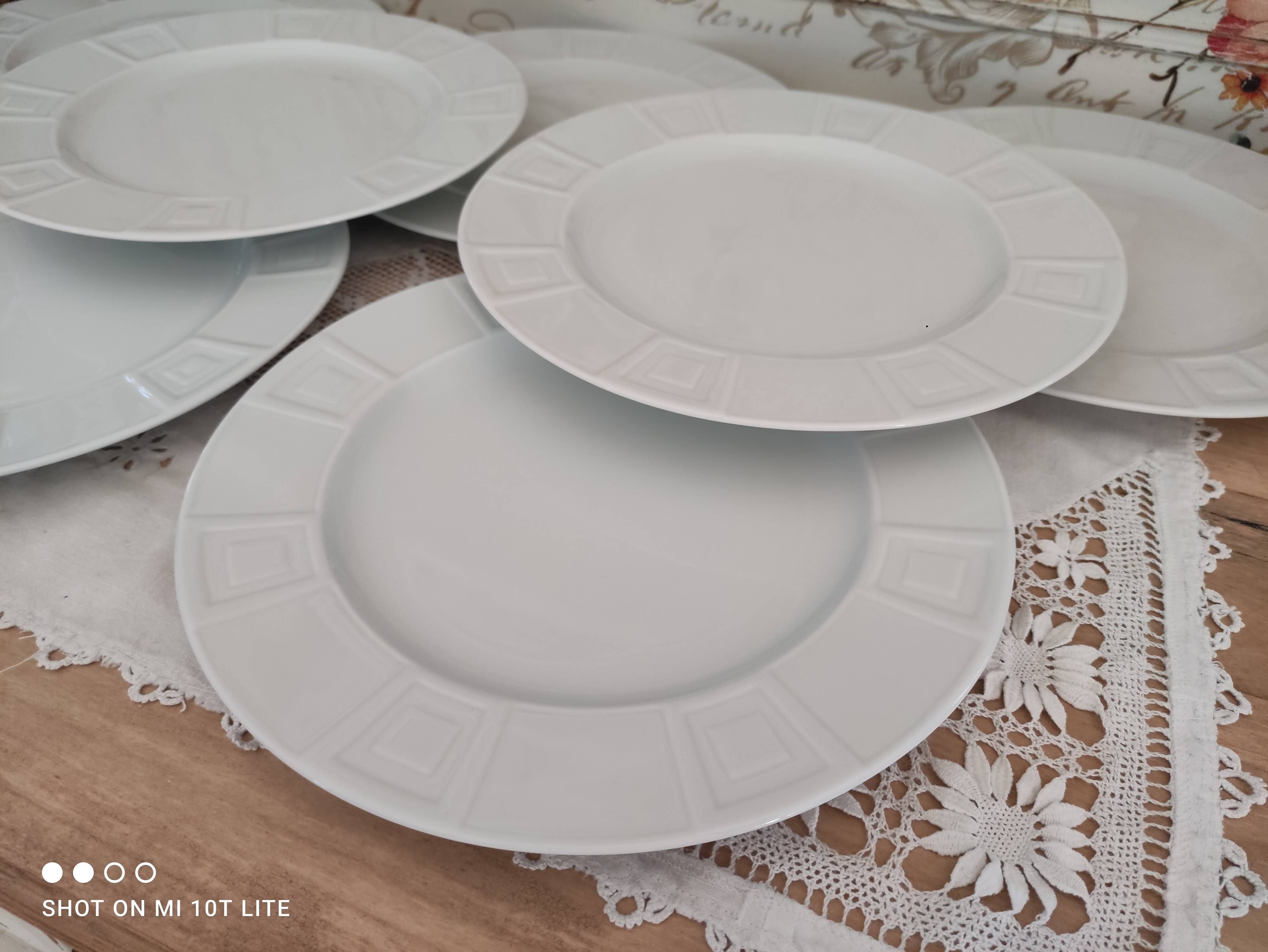 Set of 7 flat plates in white Limoges porcelain geometric decoration in relief