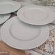 Set of 7 flat plates in white Limoges porcelain geometric decoration in relief