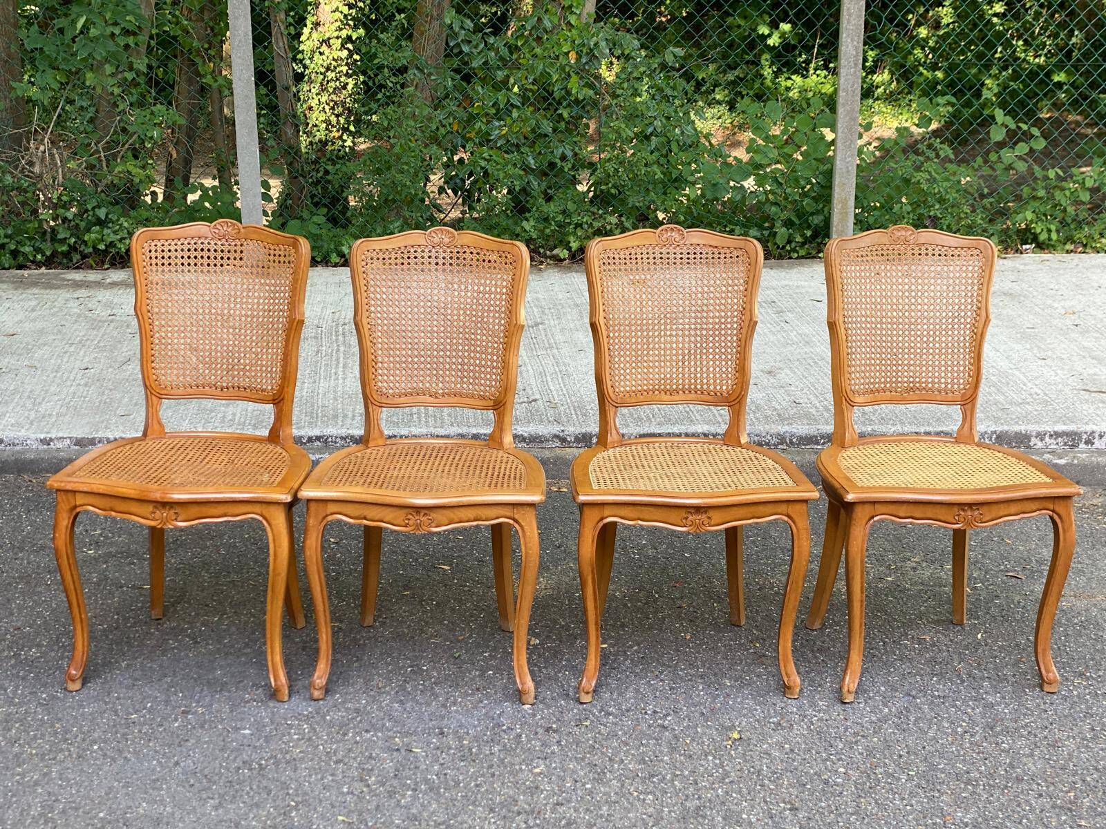 4 Louis XV dining chairs in light solid wood with caning.