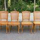 4 Louis XV dining chairs in light solid wood with caning.