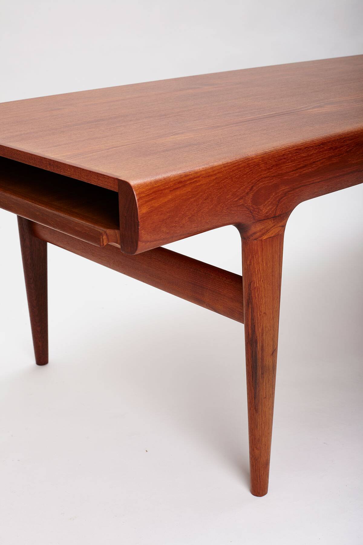 Extendable coffee table designed by Johannes Andersen for Uldum Møbelfabrik, Denmark, 1960s.