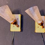 Pair of brass sconces, perforated metal and perhapx conical lampshade, France 50's