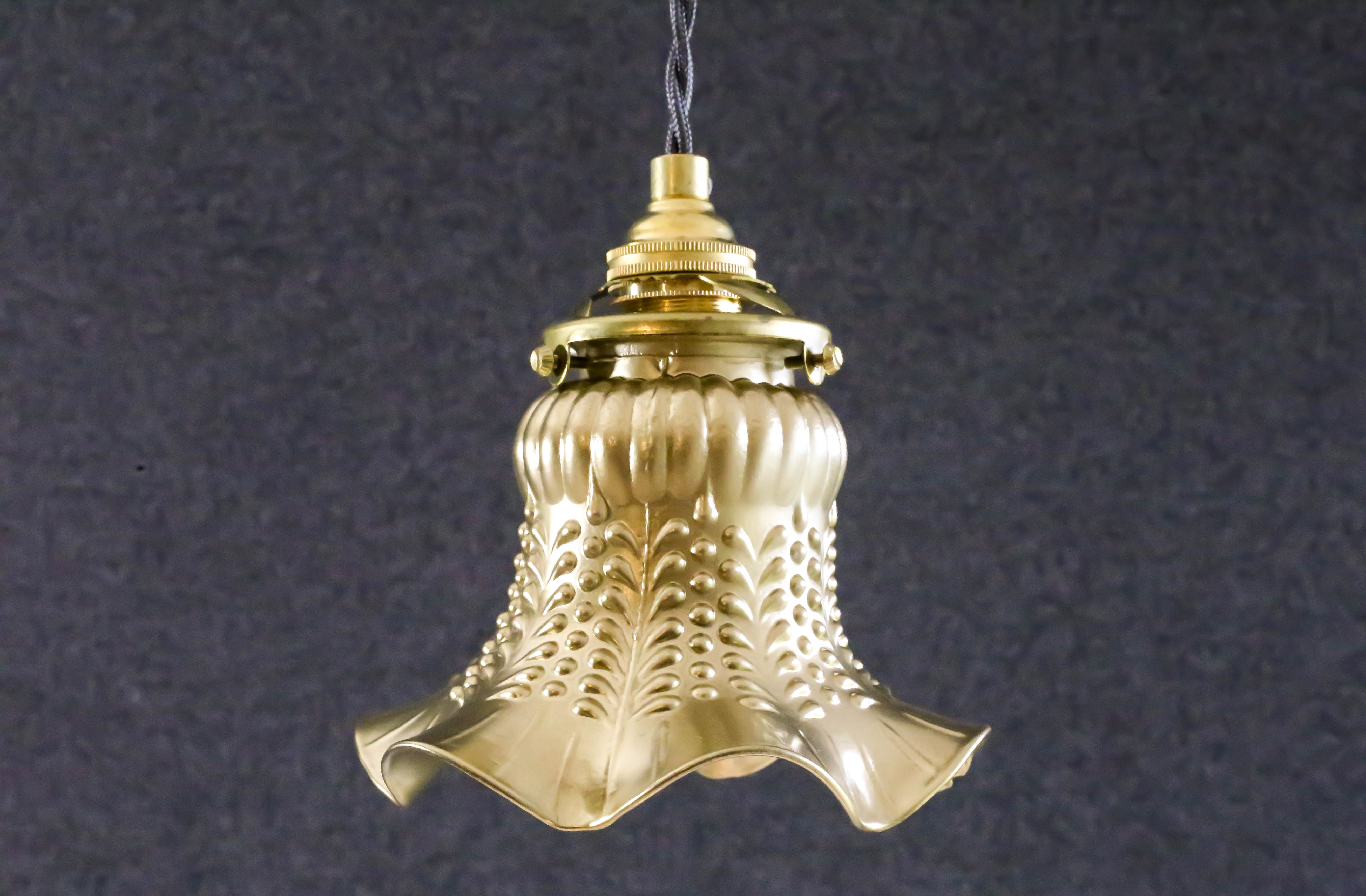 Old tulip suspension painted gold with new brass