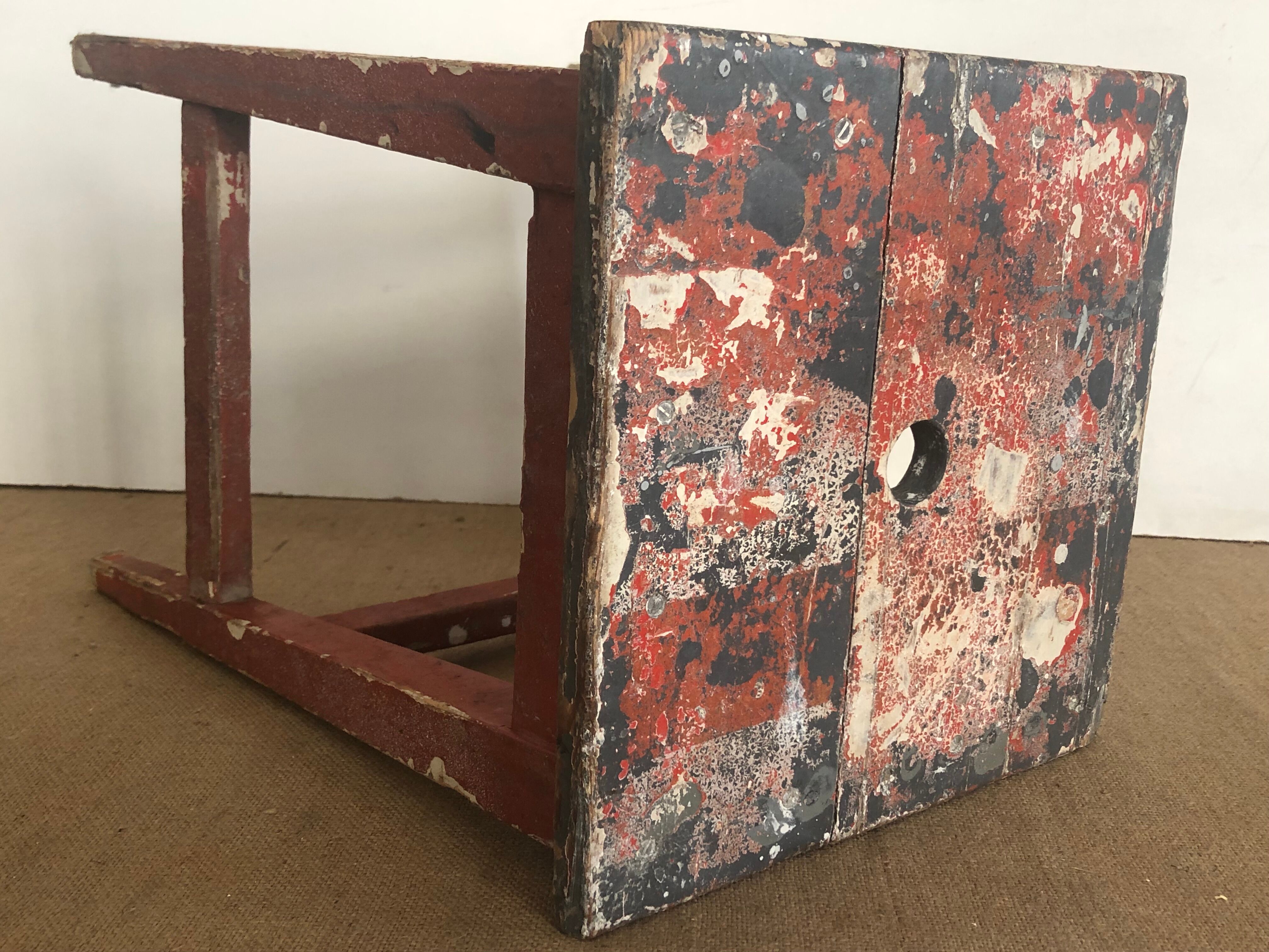 Old stool, burgundy, wabi-sabi