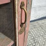 Pink showcase in Burmese teak