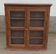 Old wooden glazed wall cabinet