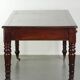 Antique English writing desk from the late 19th century with a warm colour