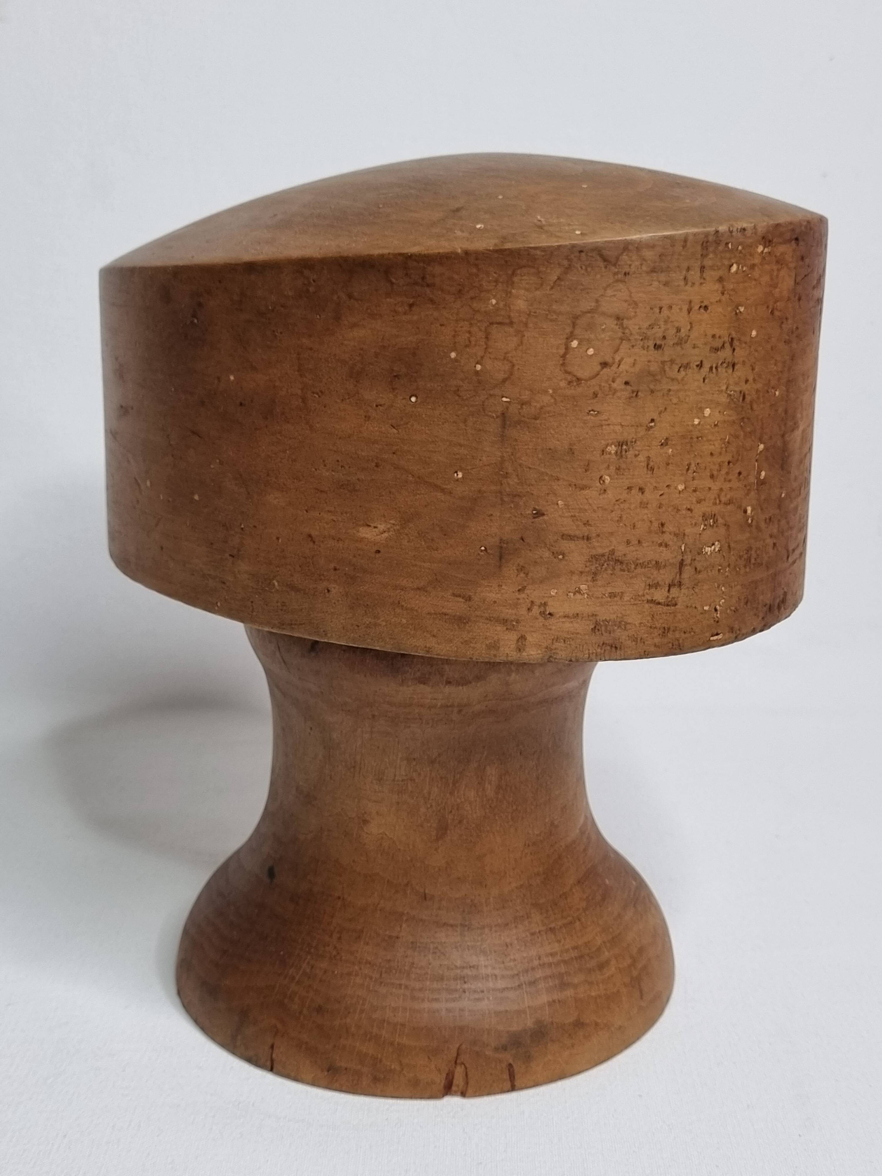 Old wooden hat shape on foot, 1900, 30