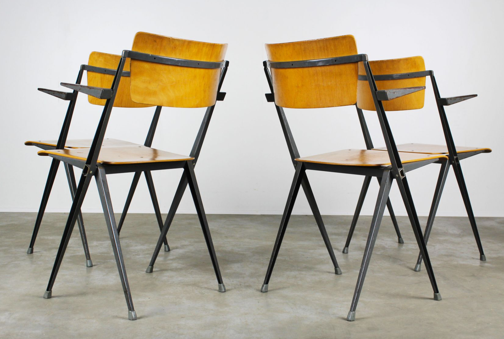 Vintage Pyramid chairs with armrests by Wim Rietveld