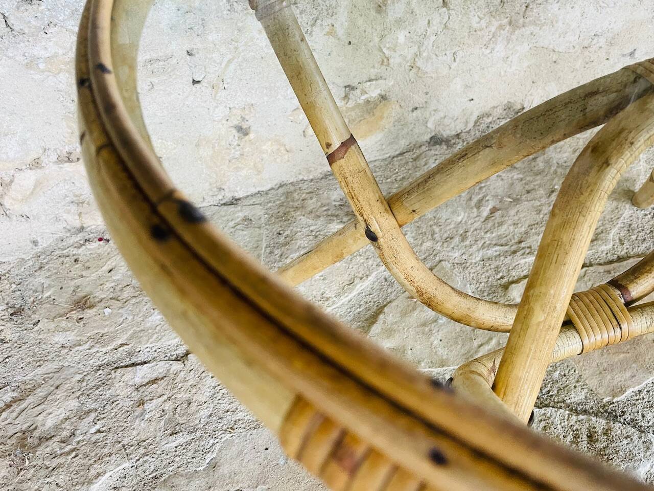 Round bamboo and rattan coffee table with glass top, circa 1960s