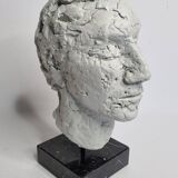 Clay sculpted head on marble base, 32 cm
