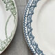 6 green and blue mismatched iron earth plates