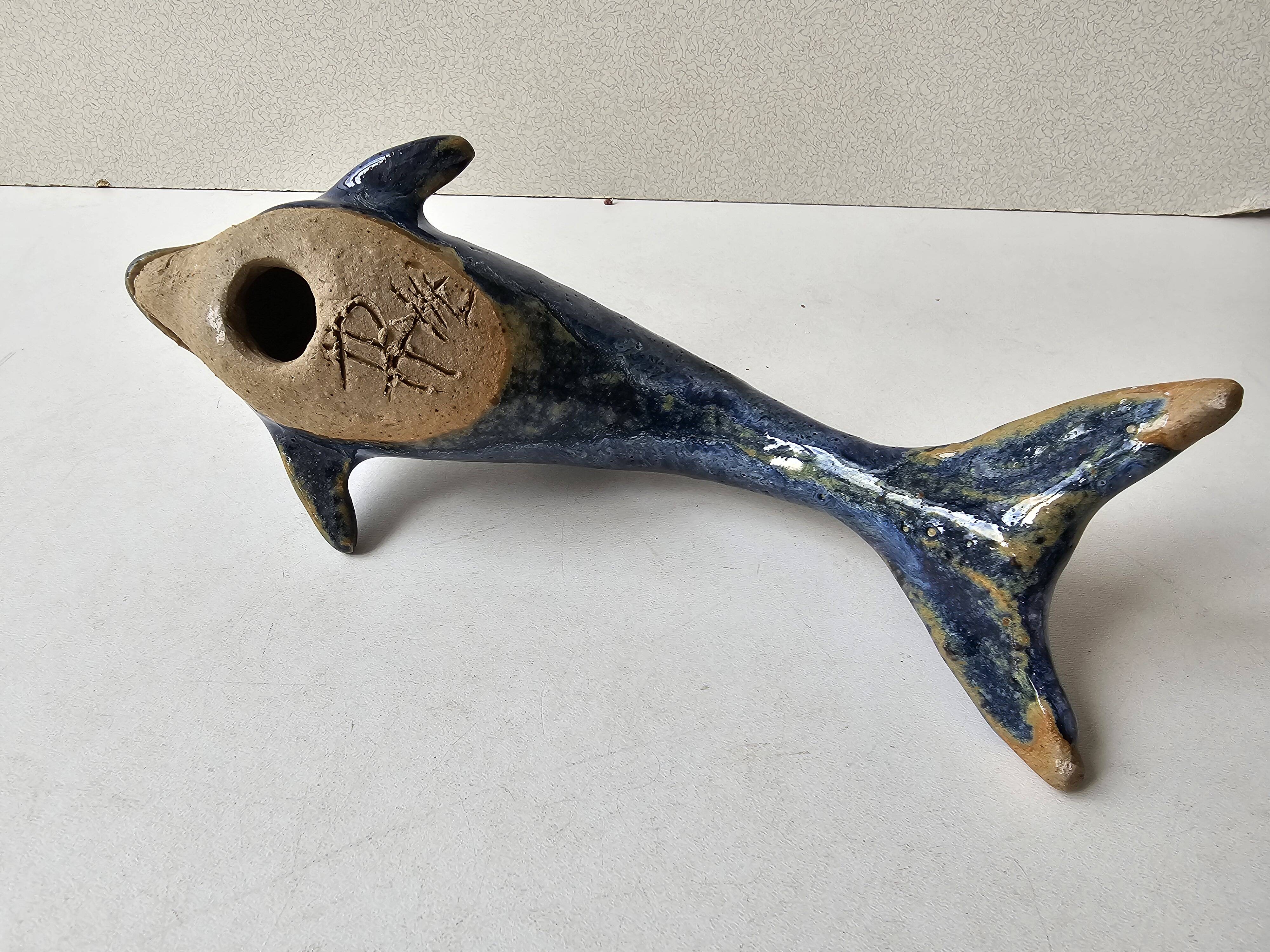 Signed blue ceramic dolphin sculpture (Signature to be identified)